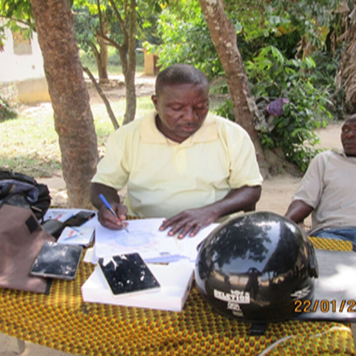 RPAL Staff registering farmers for ID cards which were given free-of-charge