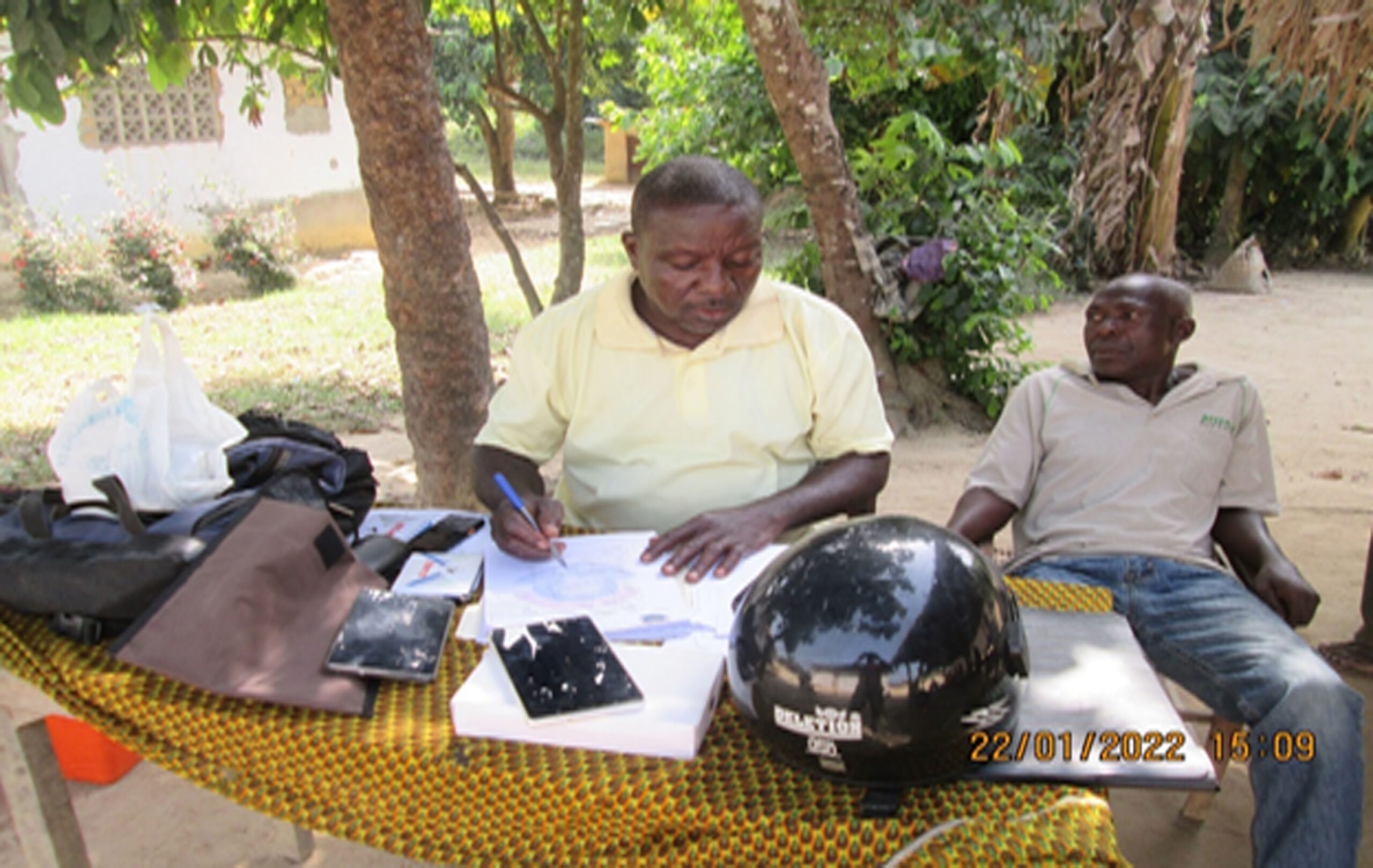 RPAL Staff registering farmers for ID cards which were given free-of-charge